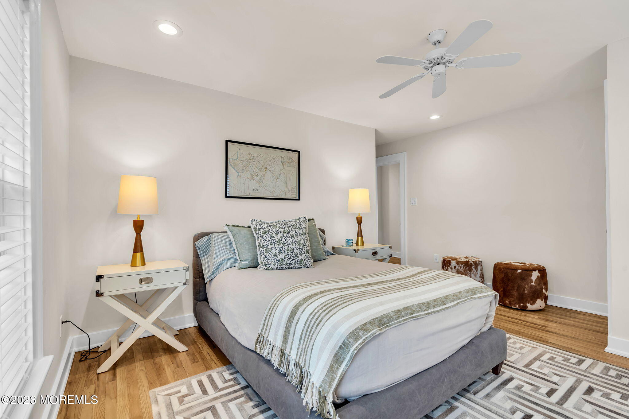 208 Salem Avenue Spring Lake, NJ 07762 - Photo 64 of 102 a bedroom with a bed and a lamp