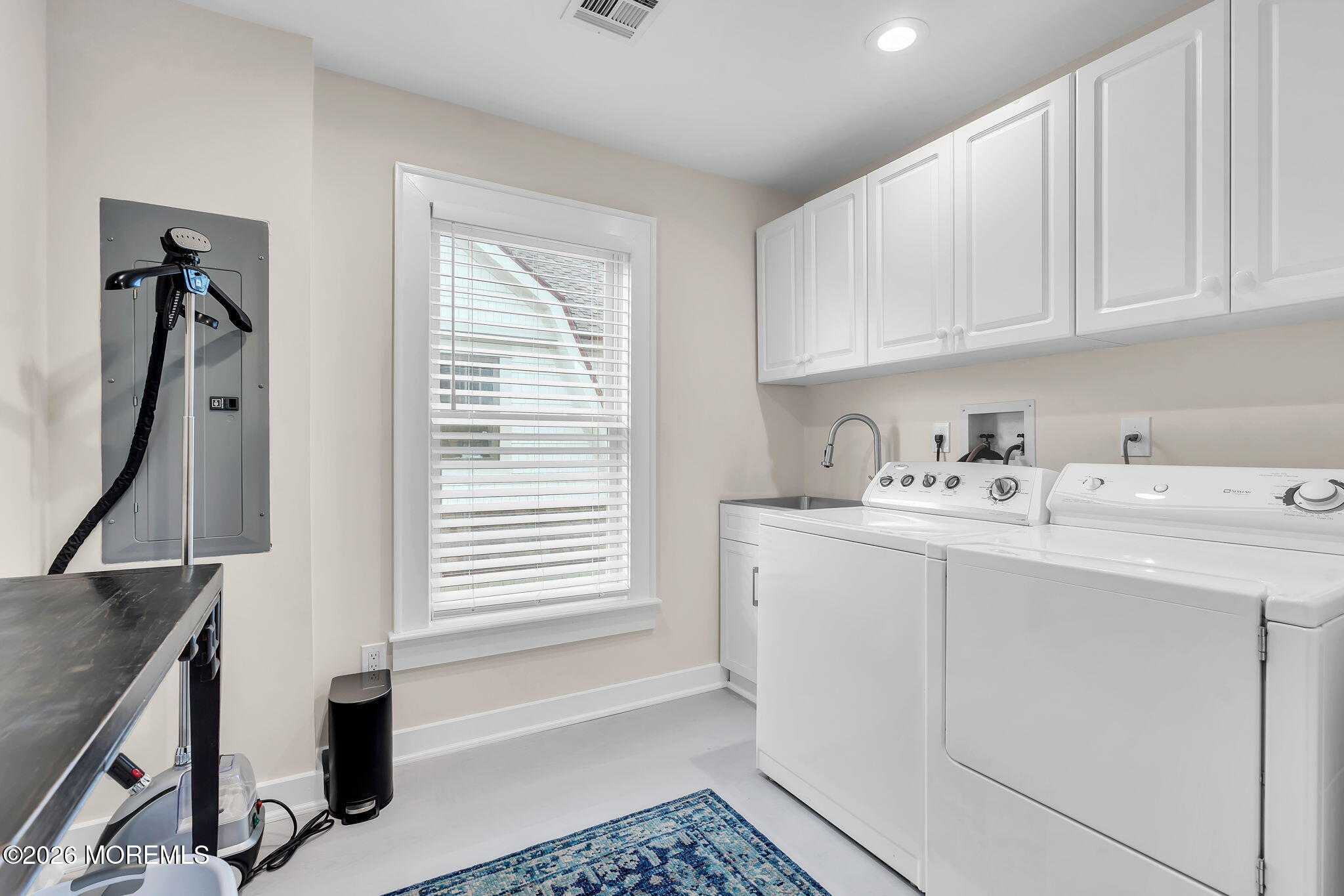 208 Salem Avenue Spring Lake, NJ 07762 - Photo 65 of 102 a utility room with cabinets washer and dryer