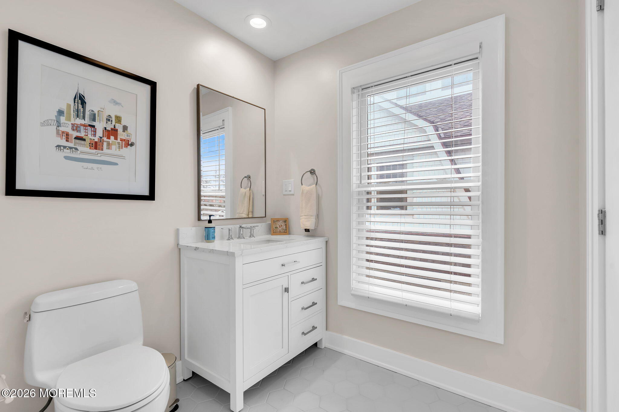 208 Salem Avenue Spring Lake, NJ 07762 - Photo 73 of 102 a bathroom with a toilet a sink and a mirror