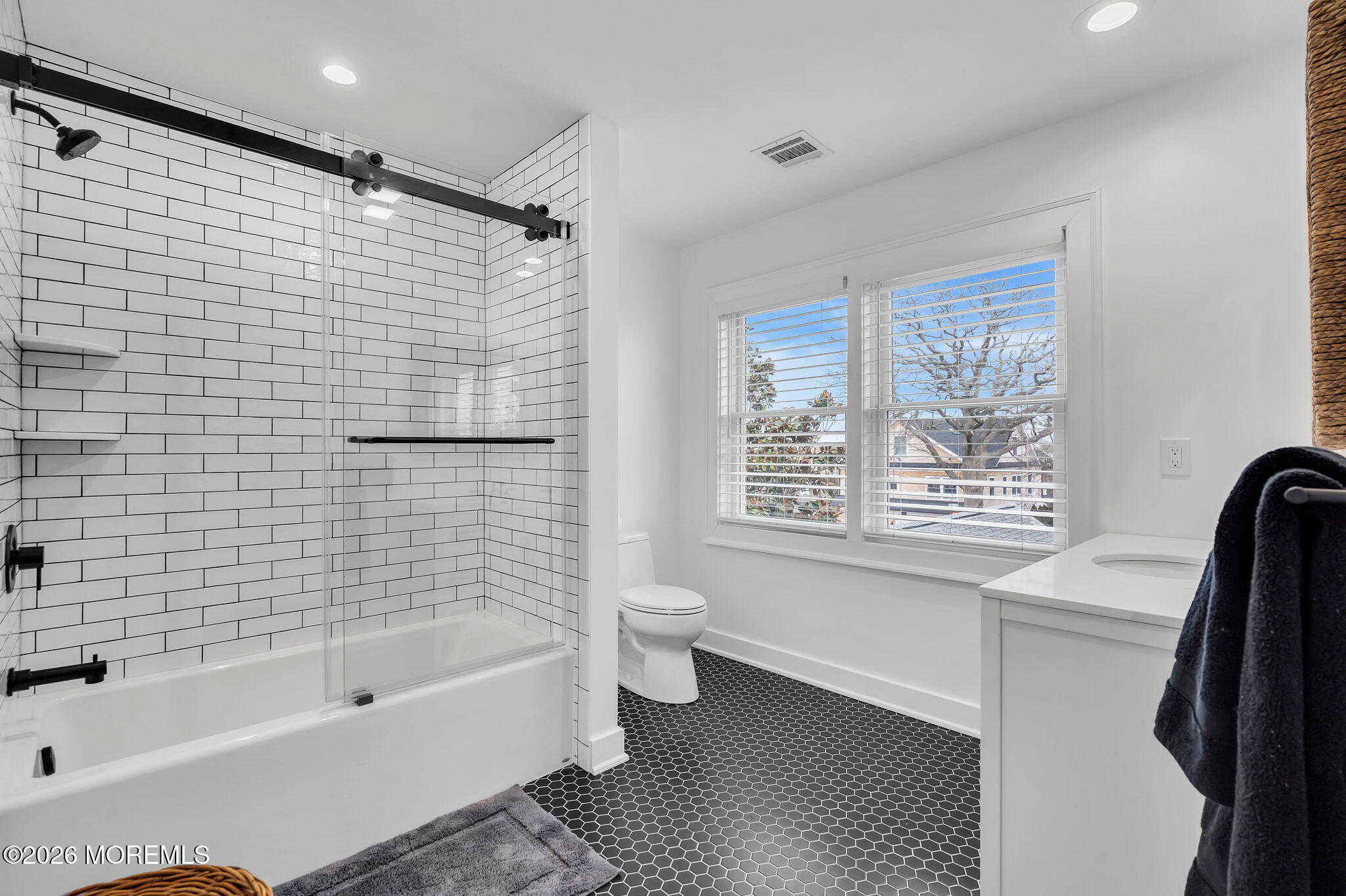 208 Salem Avenue Spring Lake, NJ 07762 - Photo 78 of 102 a bathroom with a bathtub a toilet a sink and a shower