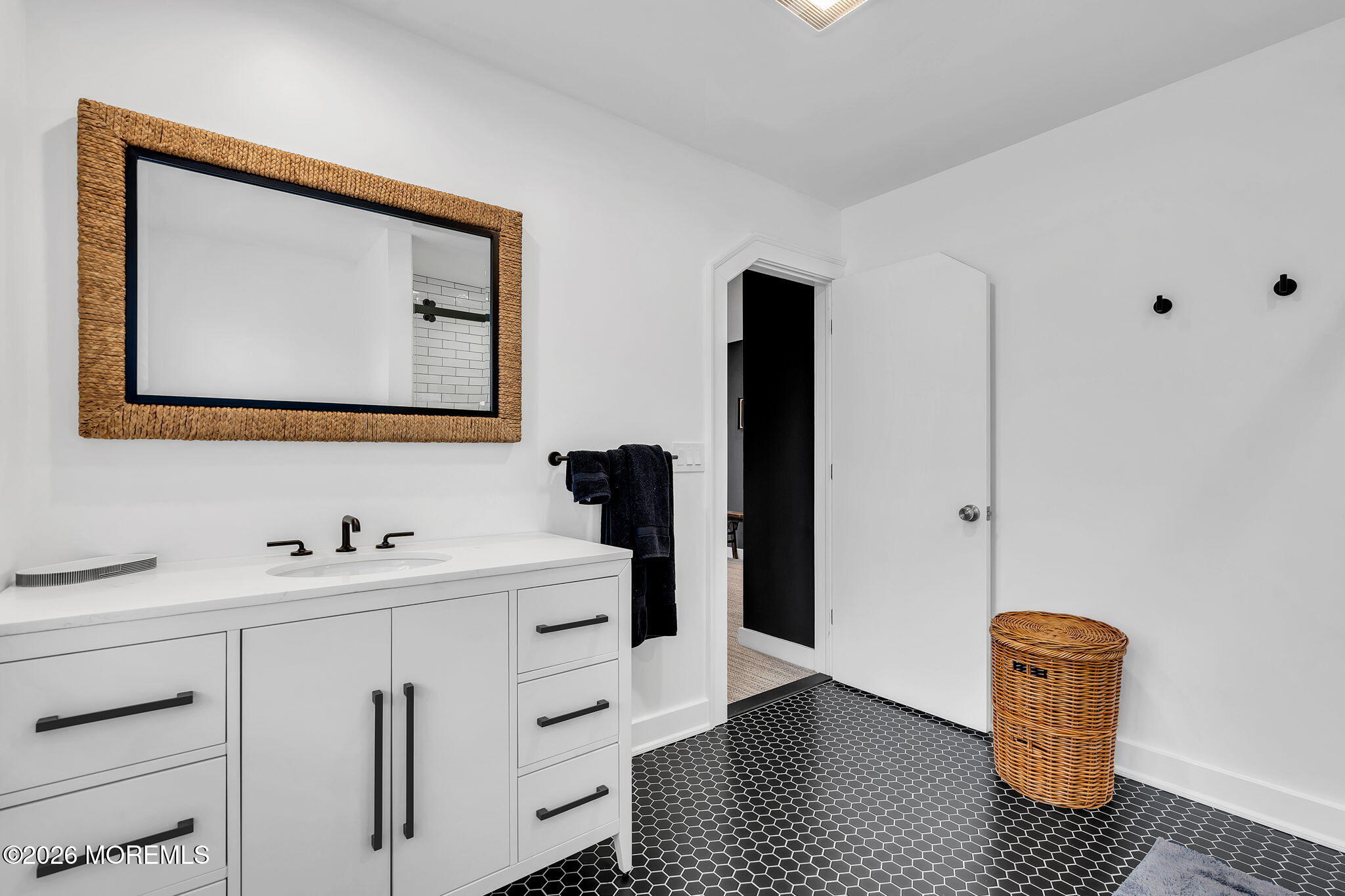 208 Salem Avenue Spring Lake, NJ 07762 - Photo 79 of 102 a bathroom with a sink and a mirror