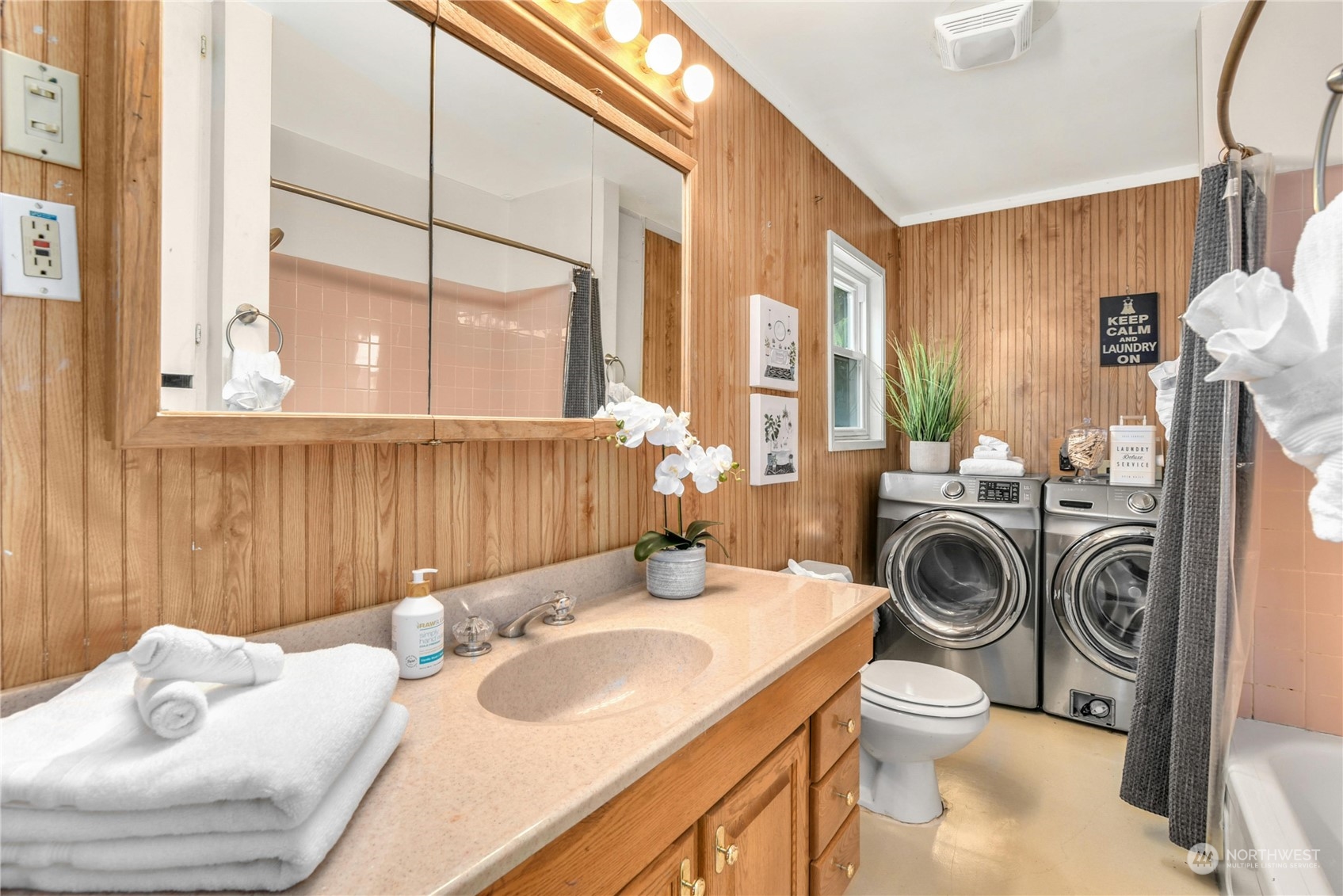 2215 Rockefeller Avenue Everett, WA 98201 - Photo 13 of 28 a bathroom with a sink vanity mirror and toilet