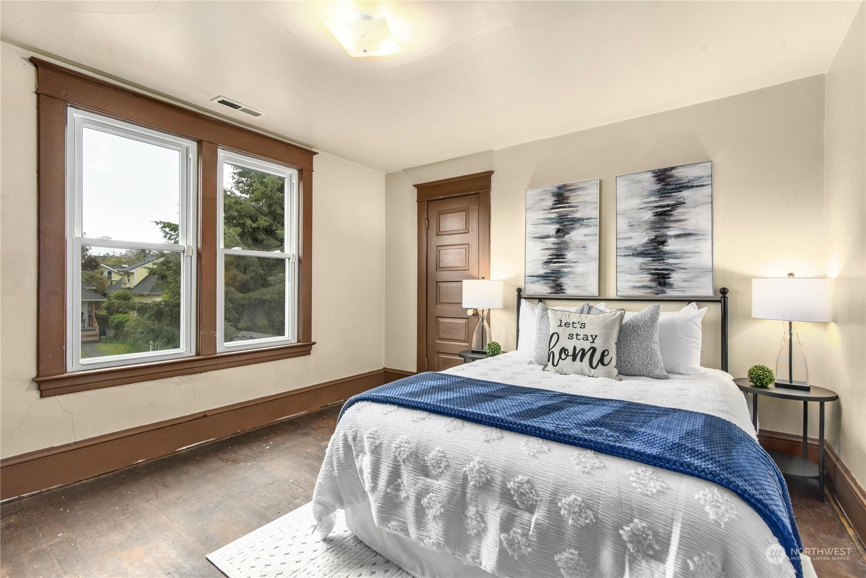 2215 Rockefeller Avenue Everett, WA 98201 - Photo 15 of 28 a bedroom with a large bed and a window