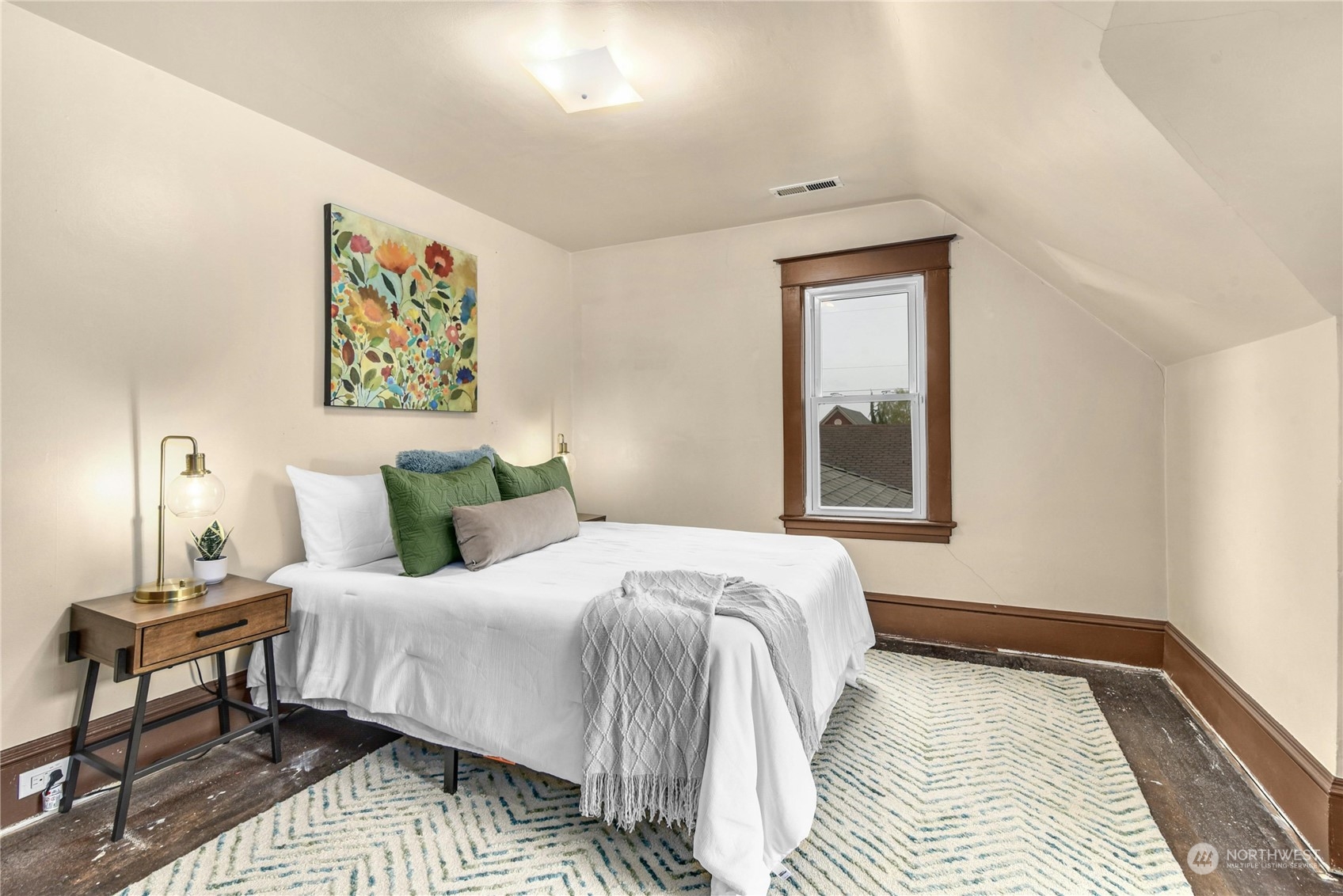 2215 Rockefeller Avenue Everett, WA 98201 - Photo 17 of 28 a bedroom with a bed and a window