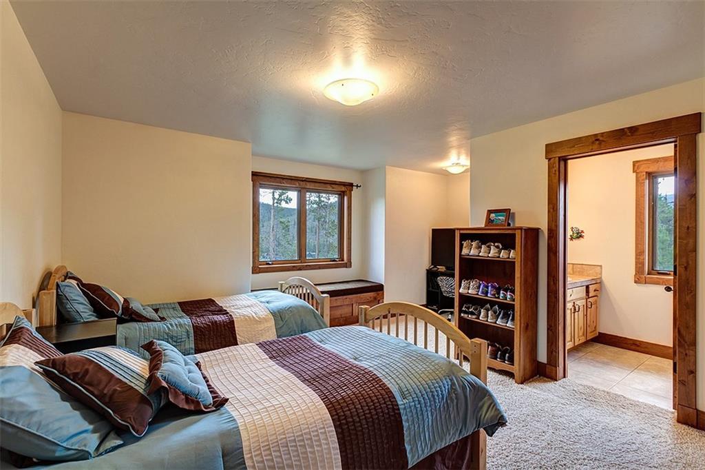 22 Braddock Drive Breckenridge, CO 80424 - Photo 30 of 35 a bedroom with a bed furniture and a window