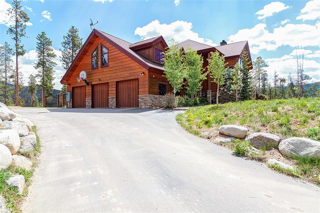 22 Braddock Drive Breckenridge, CO 80424 - Photo 32 of 35 a view of a house with a yard and pathway