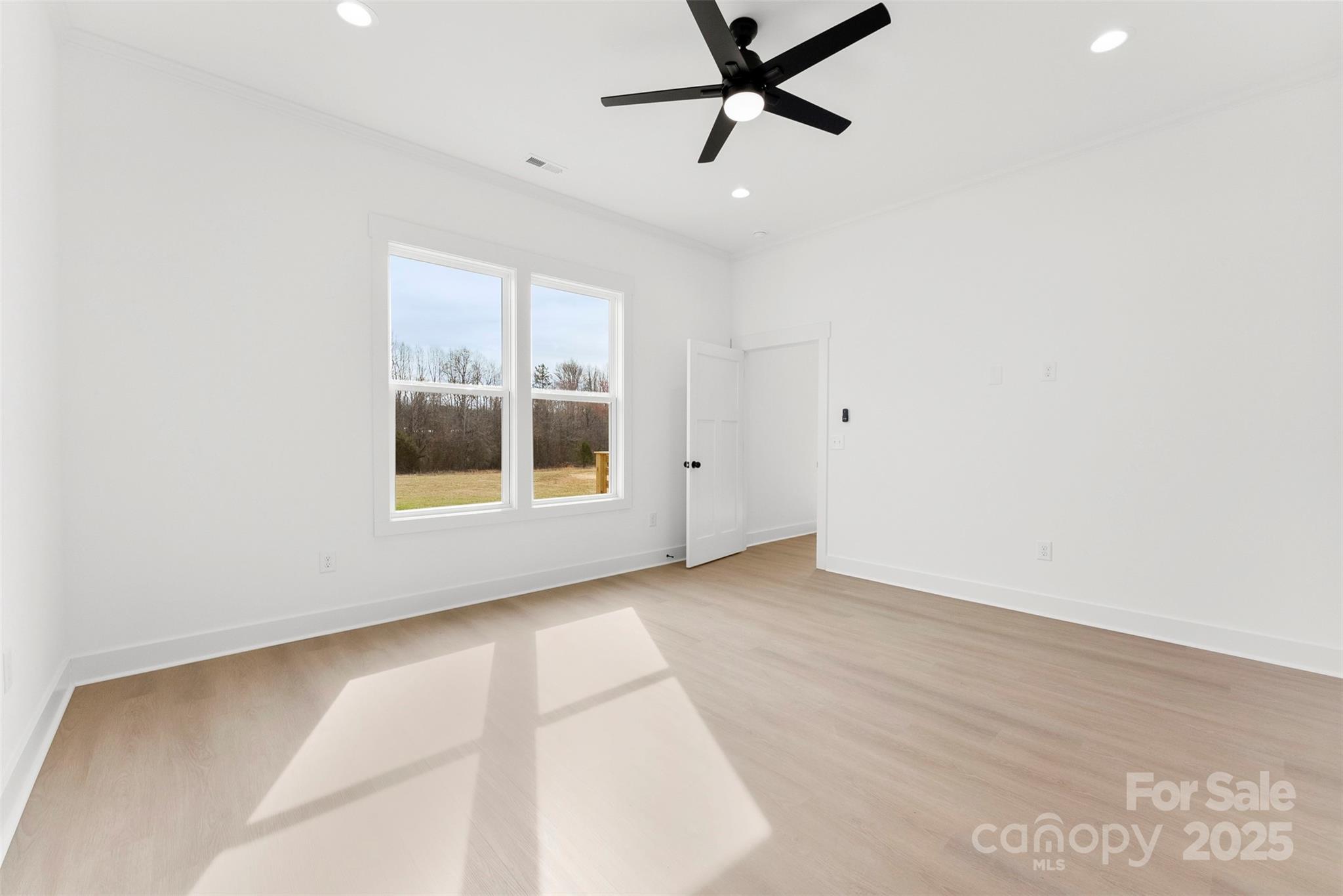 4085 Miller Road Salisbury, NC 28147 - Photo 21 of 46 a view of an empty room with a window