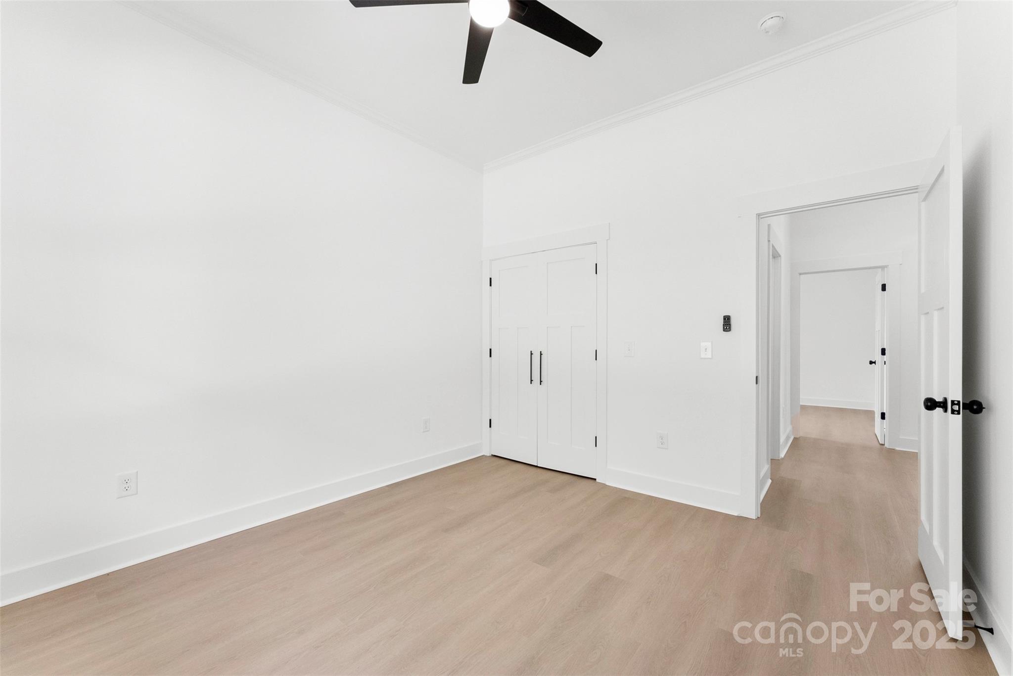 4085 Miller Road Salisbury, NC 28147 - Photo 31 of 46 an empty room with a ceiling fan and window