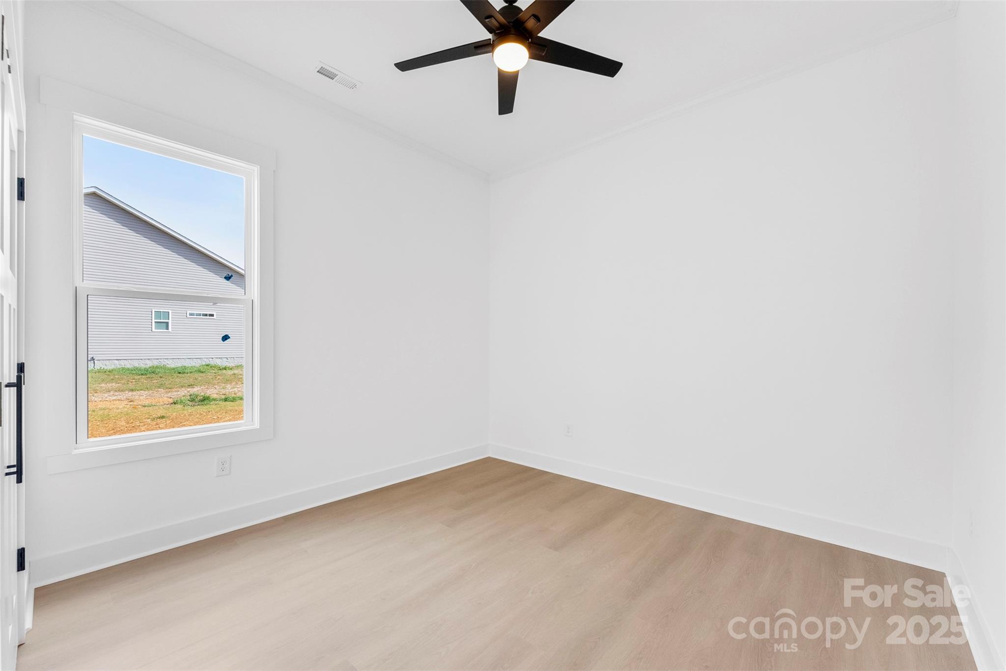 4085 Miller Road Salisbury, NC 28147 - Photo 34 of 46 a view of an empty room with a window
