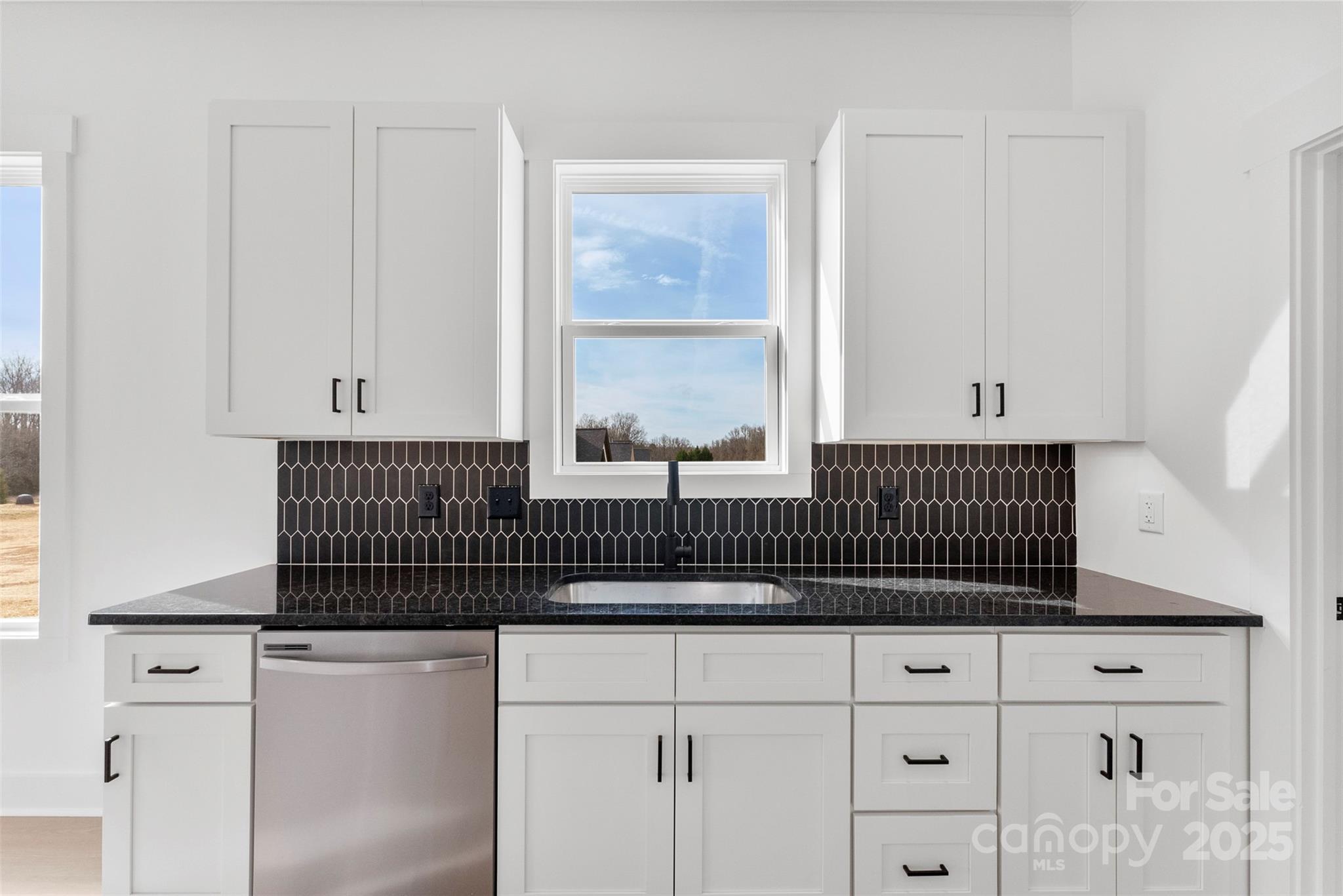 4085 Miller Road Salisbury, NC 28147 - Photo 10 of 46 a view of a utility room with cabinet