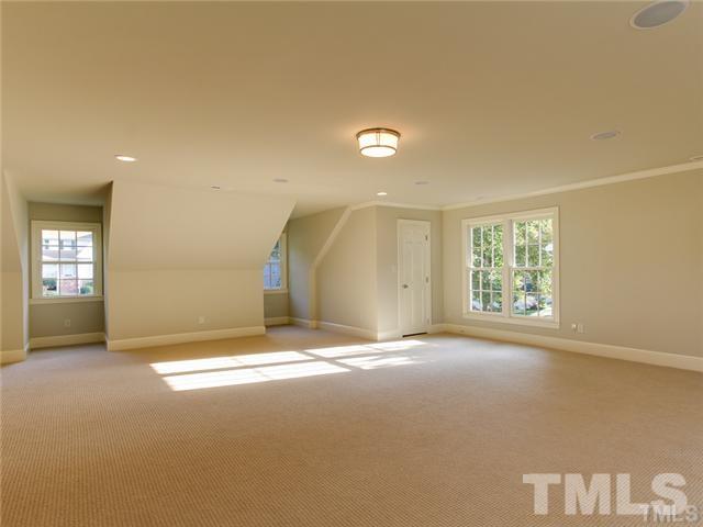 7003 North Ridge Drive Raleigh, NC 27615 - Photo 13 of 25 a view of a livingroom with a staircase