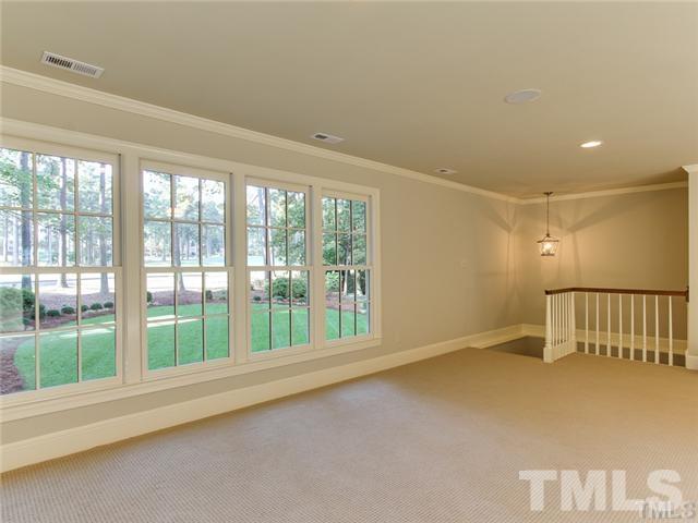 7003 North Ridge Drive Raleigh, NC 27615 - Photo 14 of 25 a view of an empty room with a window