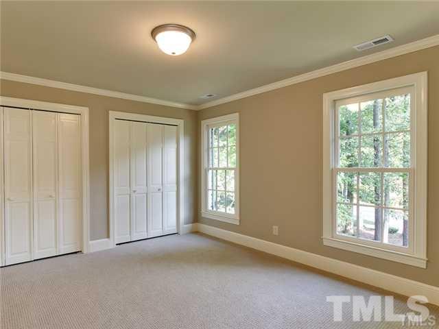 7003 North Ridge Drive Raleigh, NC 27615 - Photo 21 of 25 a view of an empty room with a window