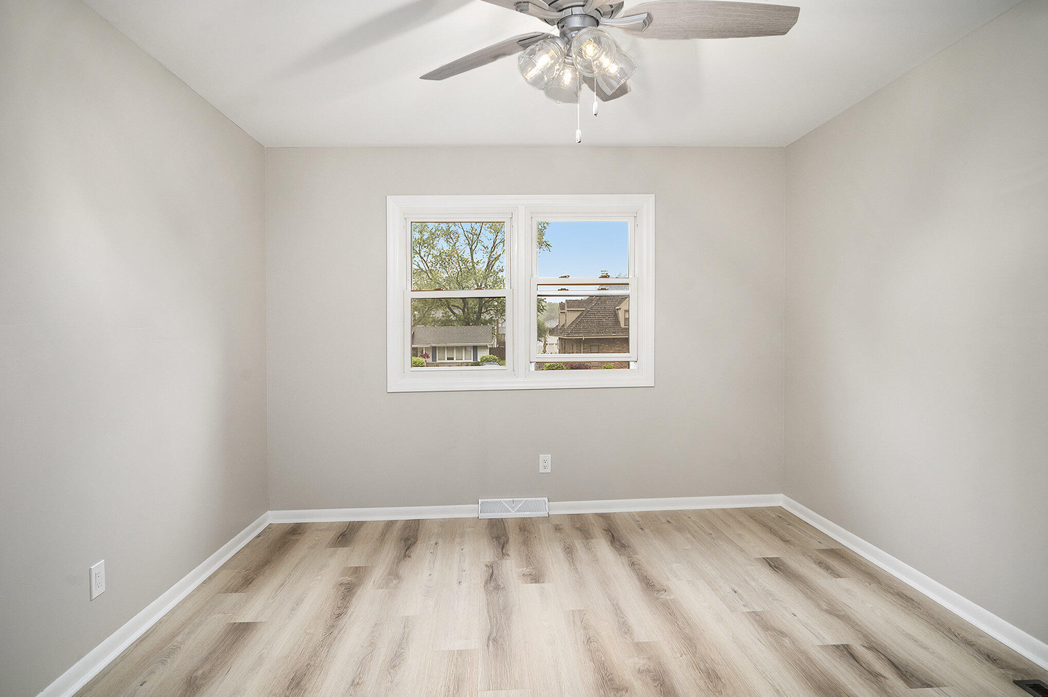 9307 Walnut Drive Munster, IN 46321 - Photo 15 of 26 an empty room with a window