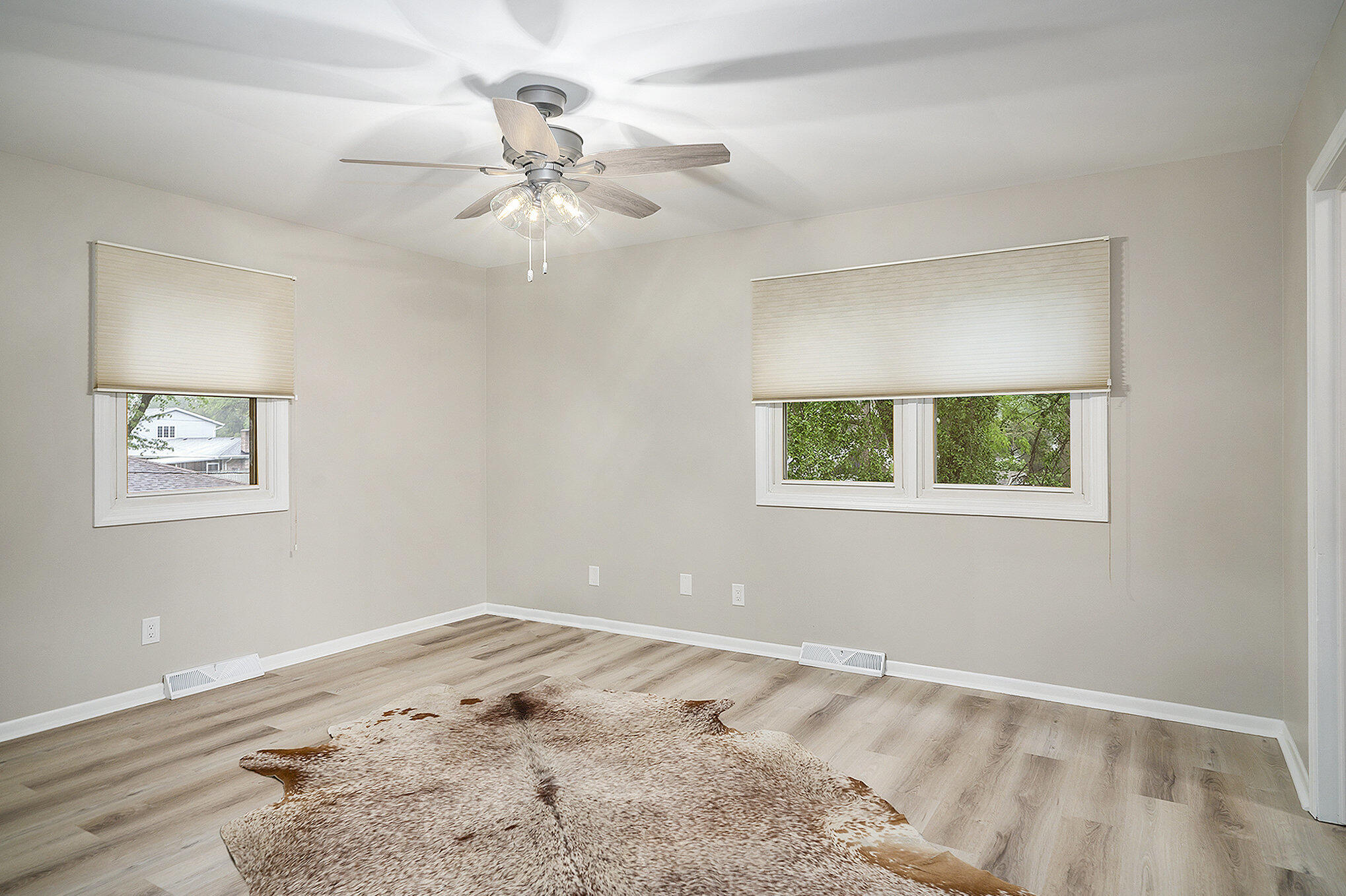 9307 Walnut Drive Munster, IN 46321 - Photo 18 of 26 a view of a bedroom with a window