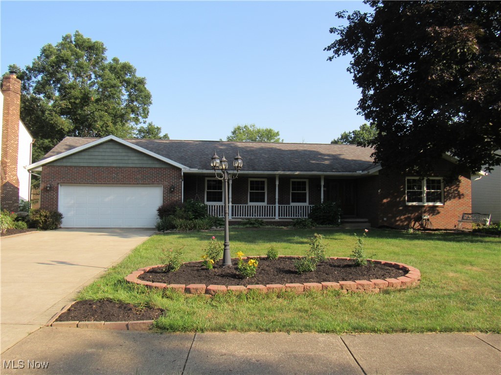 1120 Vincent Road Southeast North Canton, OH 44720 - Photo 1 of 50 Ranch home with a front load double car garage with large front yard