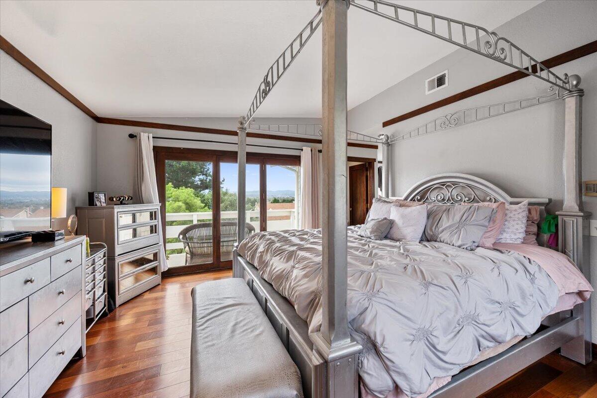 524 Avalon Street Lompoc, CA 93436 - Photo 16 of 36 a bedroom with a large bed and a flat tv screen on dresser