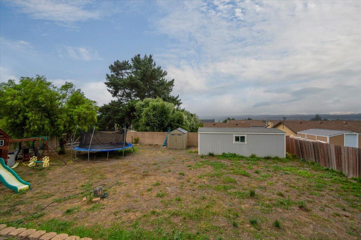524 Avalon Street Lompoc, CA 93436 - Photo 31 of 36 a backyard of a house with table and chairs