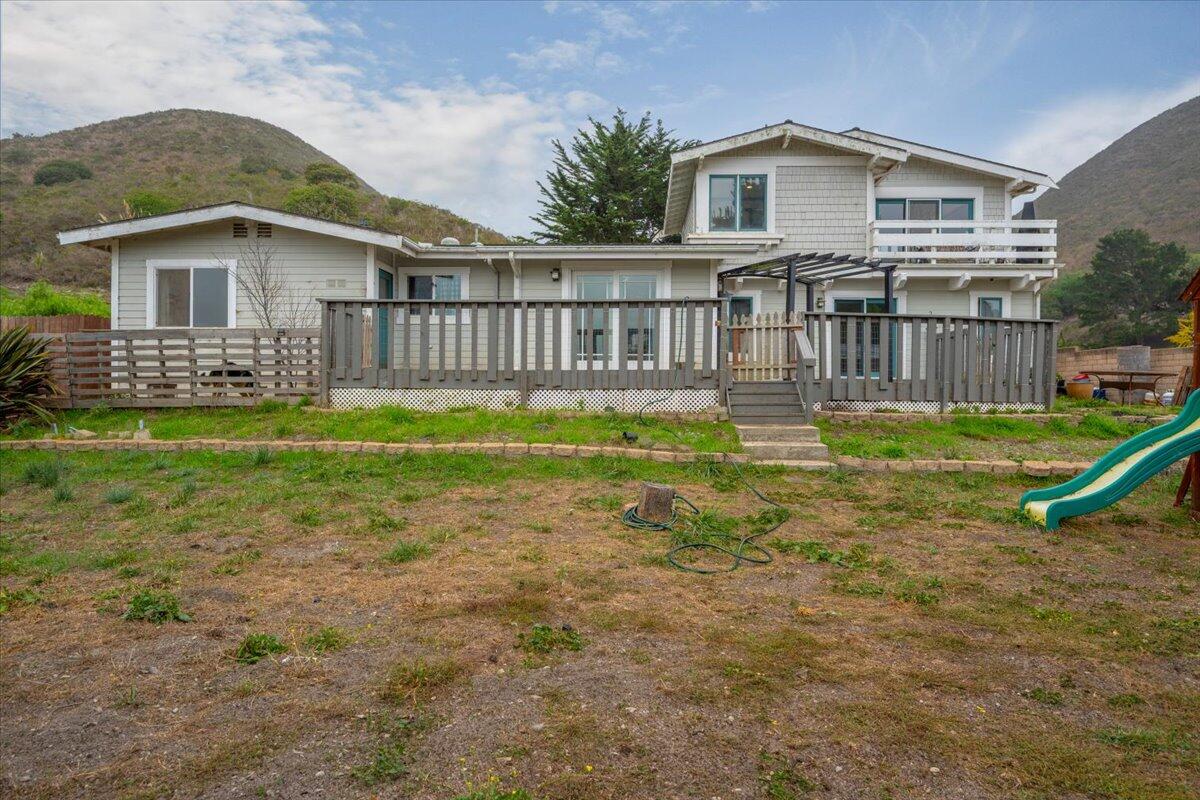 524 Avalon Street Lompoc, CA 93436 - Photo 32 of 36 a view of a house with backyard and a garden