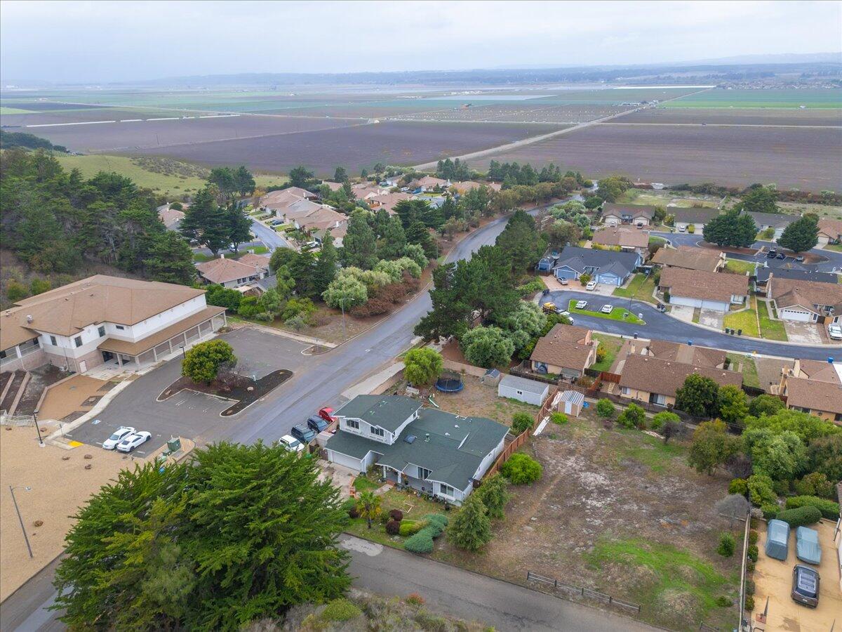 524 Avalon Street Lompoc, CA 93436 - Photo 34 of 36 an aerial view of a city with lots of residential buildings ocean and mountain view in back