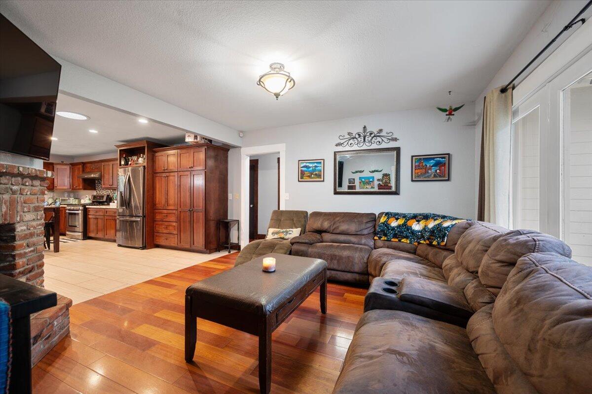 524 Avalon Street Lompoc, CA 93436 - Photo 5 of 36 a living room with furniture and a flat screen tv