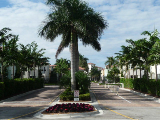1431 Northwest 48th Lane Boca Raton, FL 33431 - Photo 29 of 44 centra front gate flowers