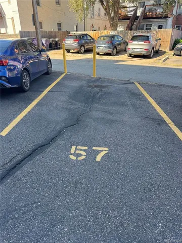 a view of a street with cars