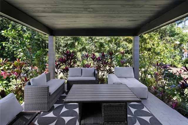 a outdoor dining space with furniture
