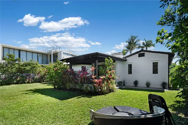 a house with garden in front of it