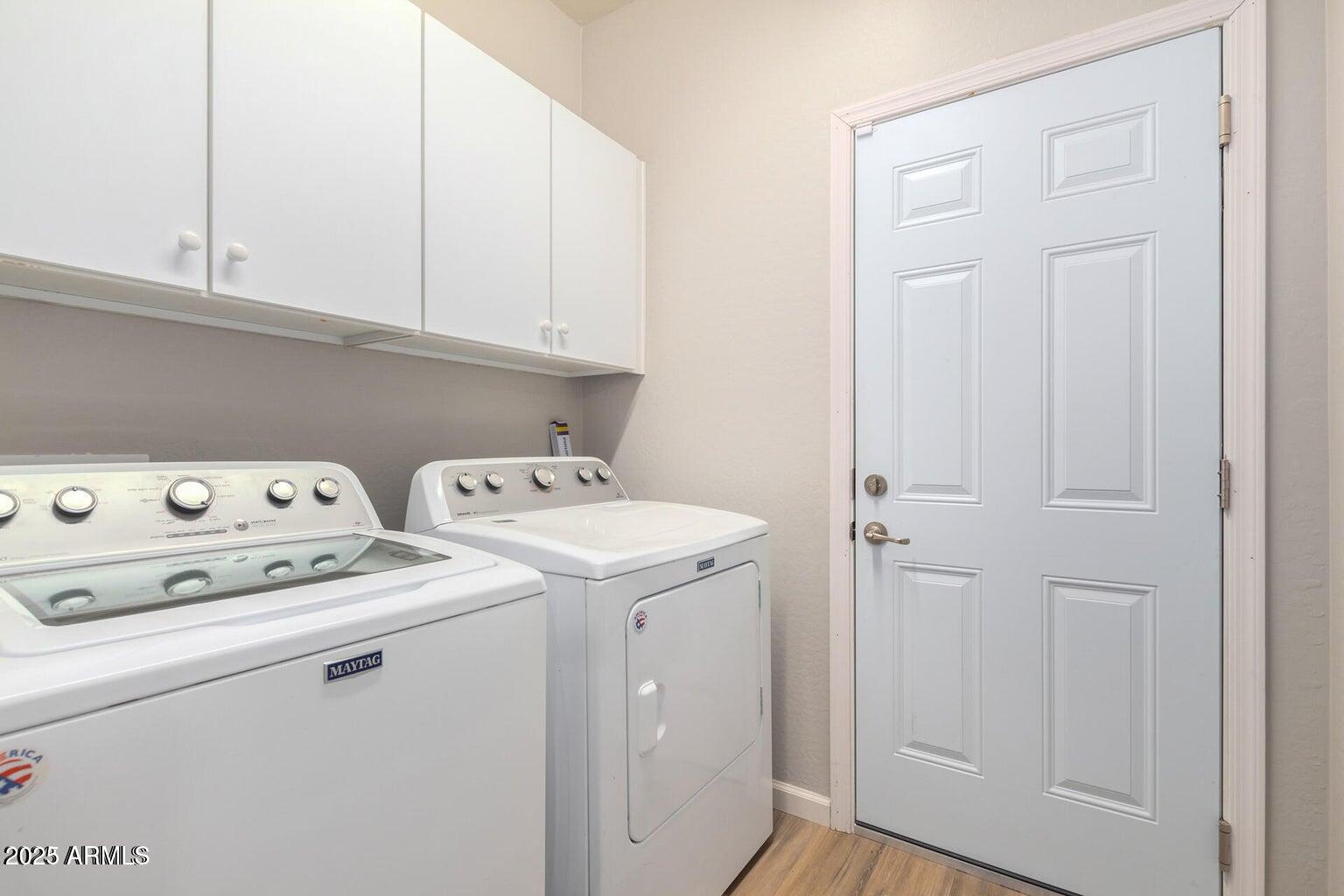 4674 South Twinleaf Drive Gilbert, AZ 85297 - Photo 14 of 18 a utility room with dryer and washer