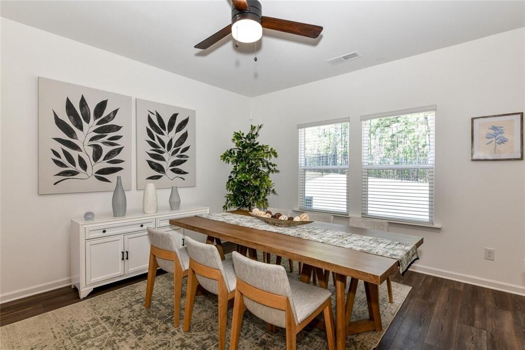 12006 Crosswicks Road, Unit SUNBURST Union City, GA 30291 - Photo 11 of 24 a dining room with furniture and window