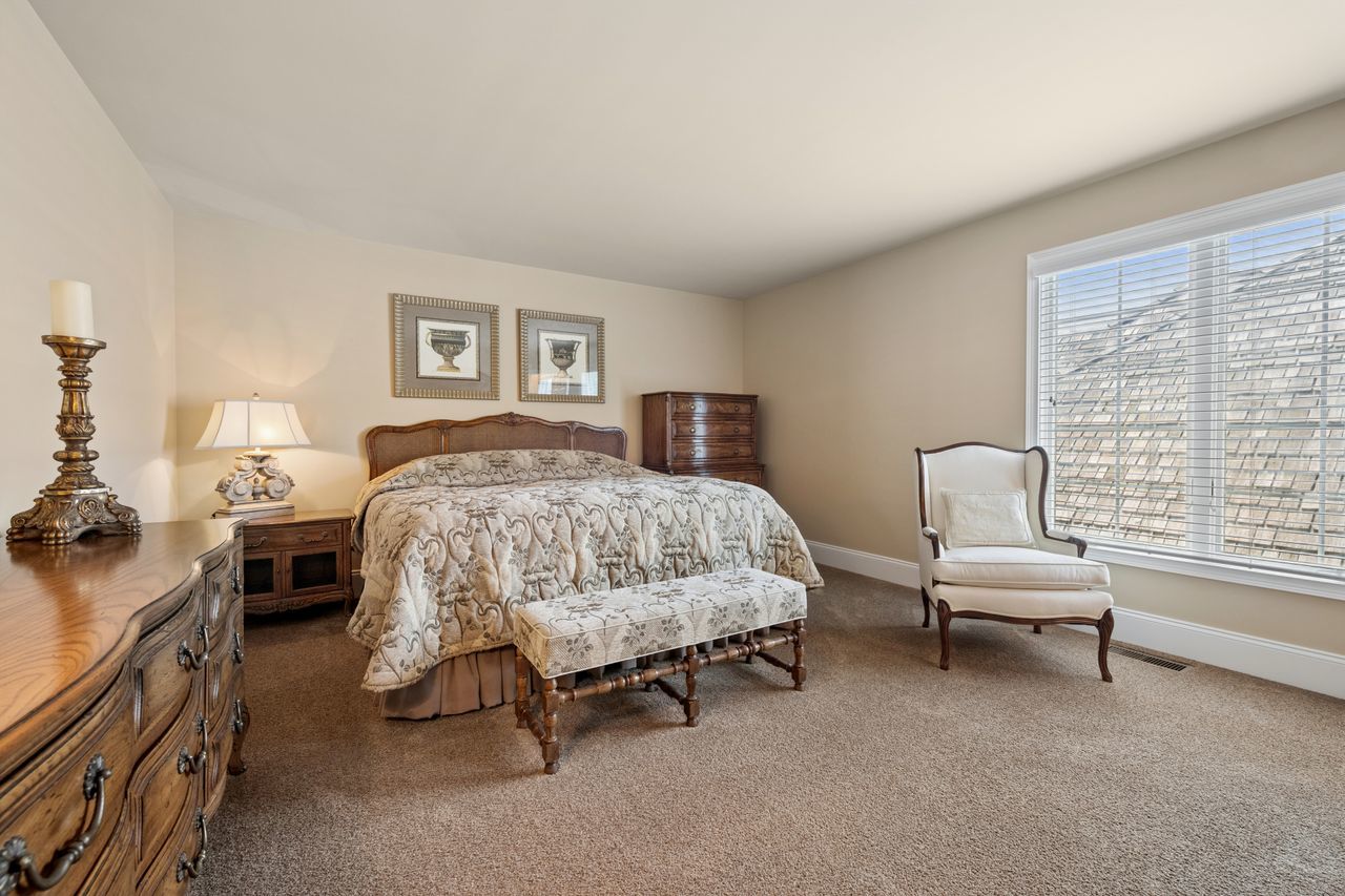 1029 Ridgeview Drive Inverness, IL 60010 - Photo 29 of 58 a bedroom with a bed chair and a window