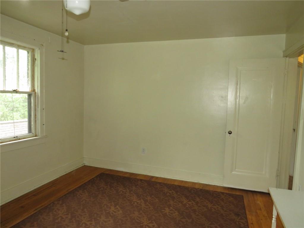 423 Braddock Road Pittsburgh, PA 15221 - Photo 18 of 36 an empty room with windows