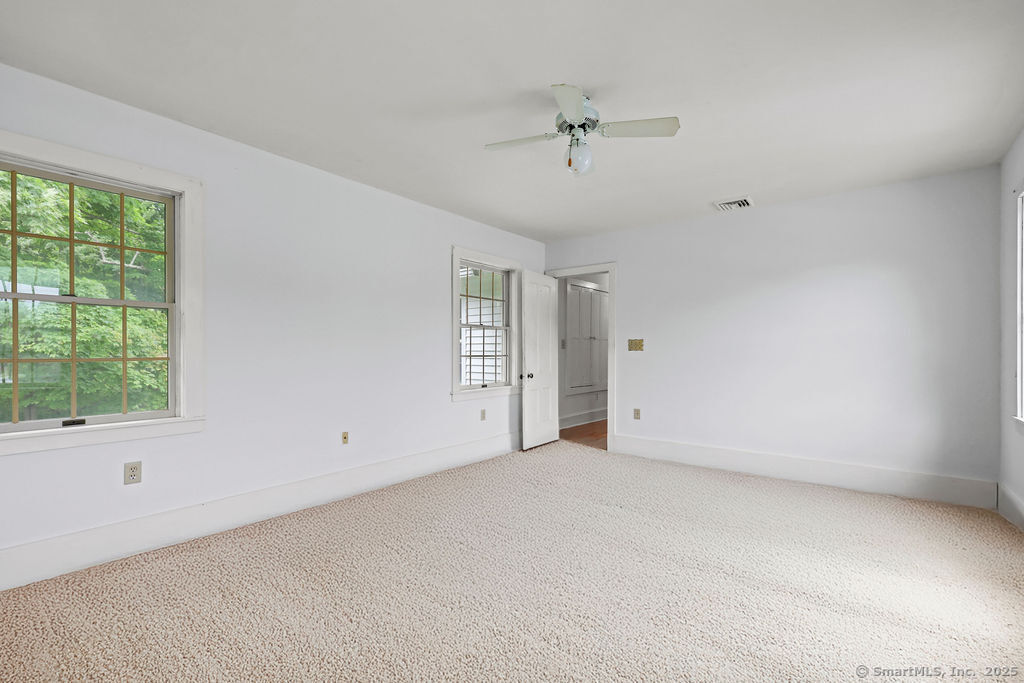 88 Powder Hill Road Middlefield, CT 06455 - Photo 23 of 40 a view of an empty room with a window