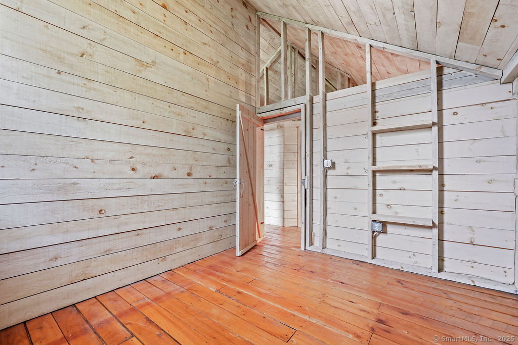 88 Powder Hill Road Middlefield, CT 06455 - Photo 30 of 40 a view of a small space built with hardwood