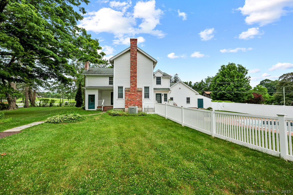 88 Powder Hill Road Middlefield, CT 06455 - Photo 3 of 40 a view of a house with backyard and garden