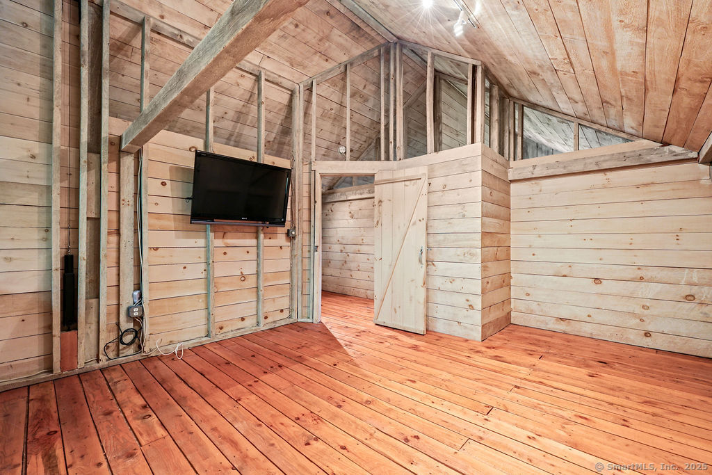 88 Powder Hill Road Middlefield, CT 06455 - Photo 33 of 40 a view of a terrace with wooden floor and furniture