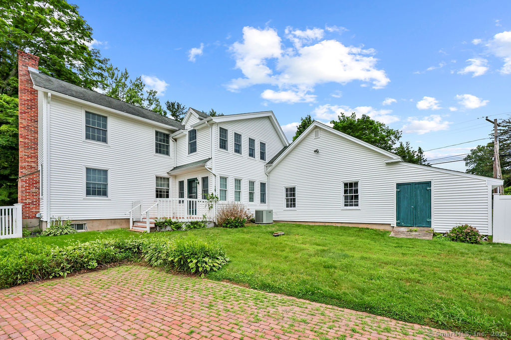 88 Powder Hill Road Middlefield, CT 06455 - Photo 5 of 40 a front view of house with yard and green space