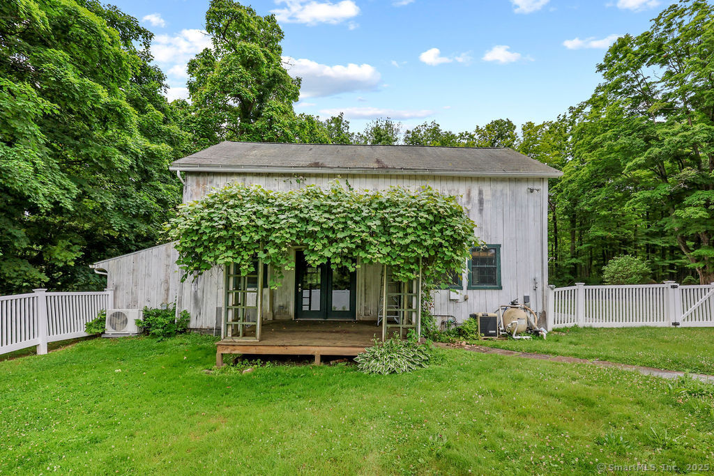 88 Powder Hill Road Middlefield, CT 06455 - Photo 7 of 40 a view of a house with backyard and a garden