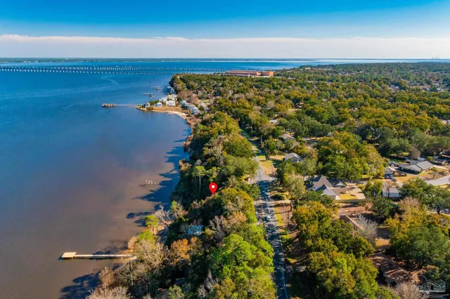 a view of swimming pool with a yard