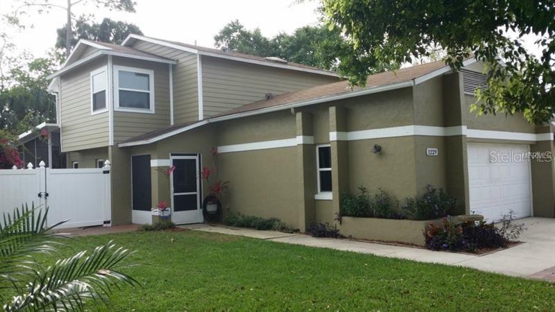 1229 Spring Lite Way Orlando, FL 32825 - Photo 1 of 1 a view of a back yard of the house