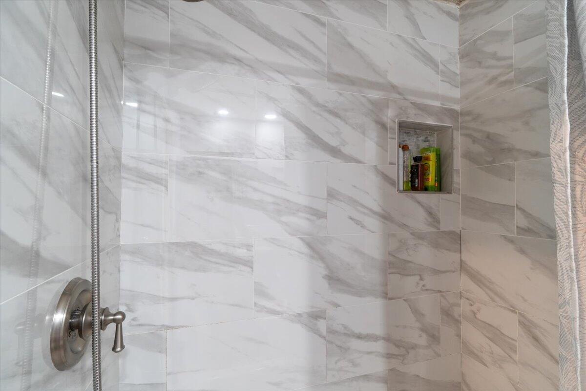 430 80th Street Marathon, FL 33050 - Photo 17 of 44 a bathroom with a shower