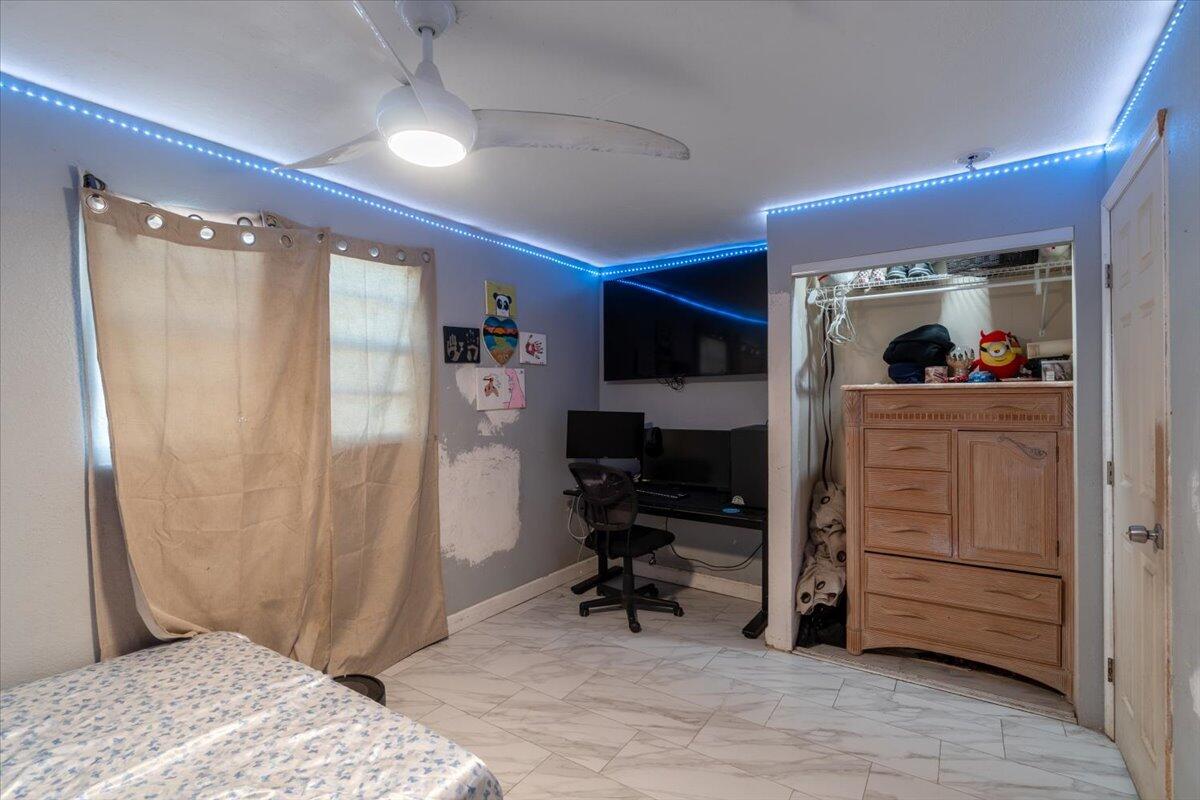 430 80th Street Marathon, FL 33050 - Photo 26 of 44 a bedroom with a bed and a bathroom