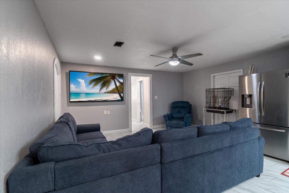 430 80th Street Marathon, FL 33050 - Photo 5 of 44 a living room with furniture and a ceiling fan