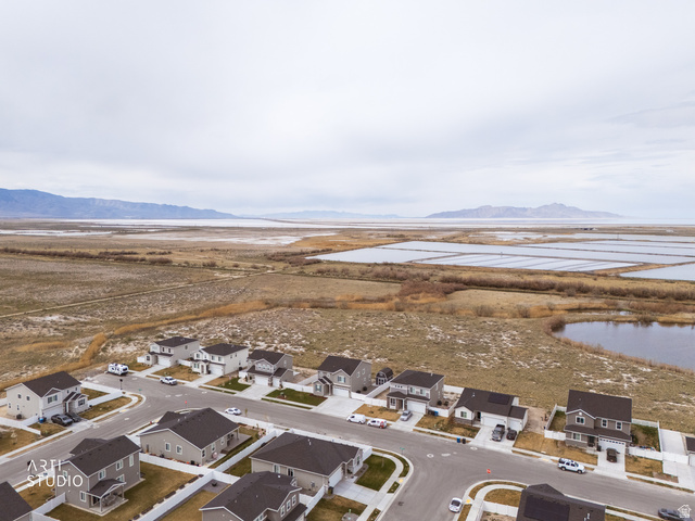 540 Lefty Lane Tooele, UT 84074 - Photo 38 of 48 Aerial perspective of suburban area featuring a water and mountain view