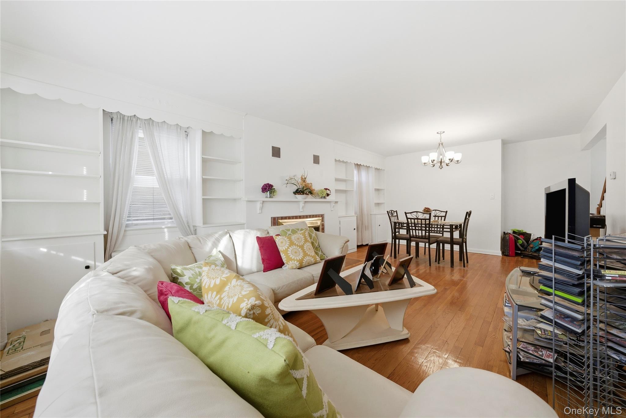 4161 Monticello Avenue Bronx, NY 10466 - Photo 20 of 38 a living room with furniture and a flat screen tv