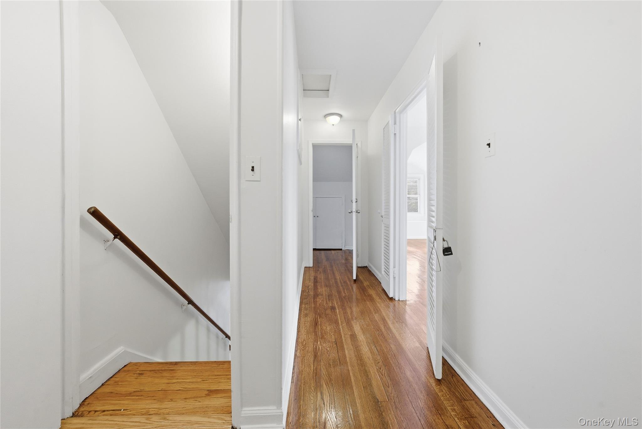 4161 Monticello Avenue Bronx, NY 10466 - Photo 32 of 38 a view of hallway with wooden floor