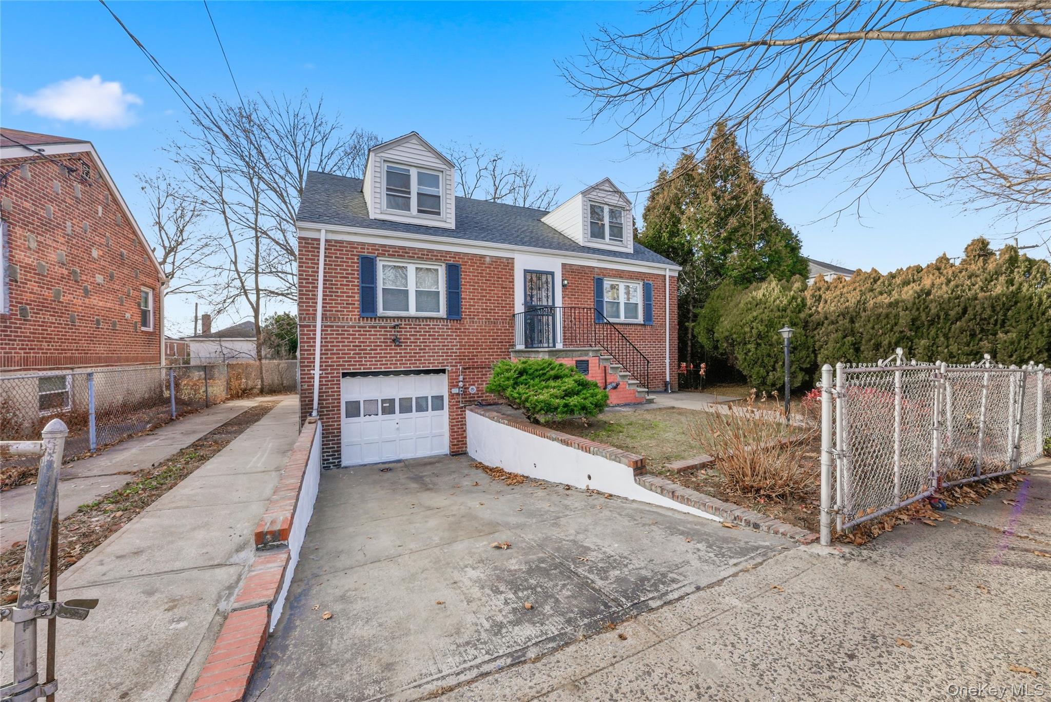 4161 Monticello Avenue Bronx, NY 10466 - Photo 9 of 38 a front view of a house with a yard