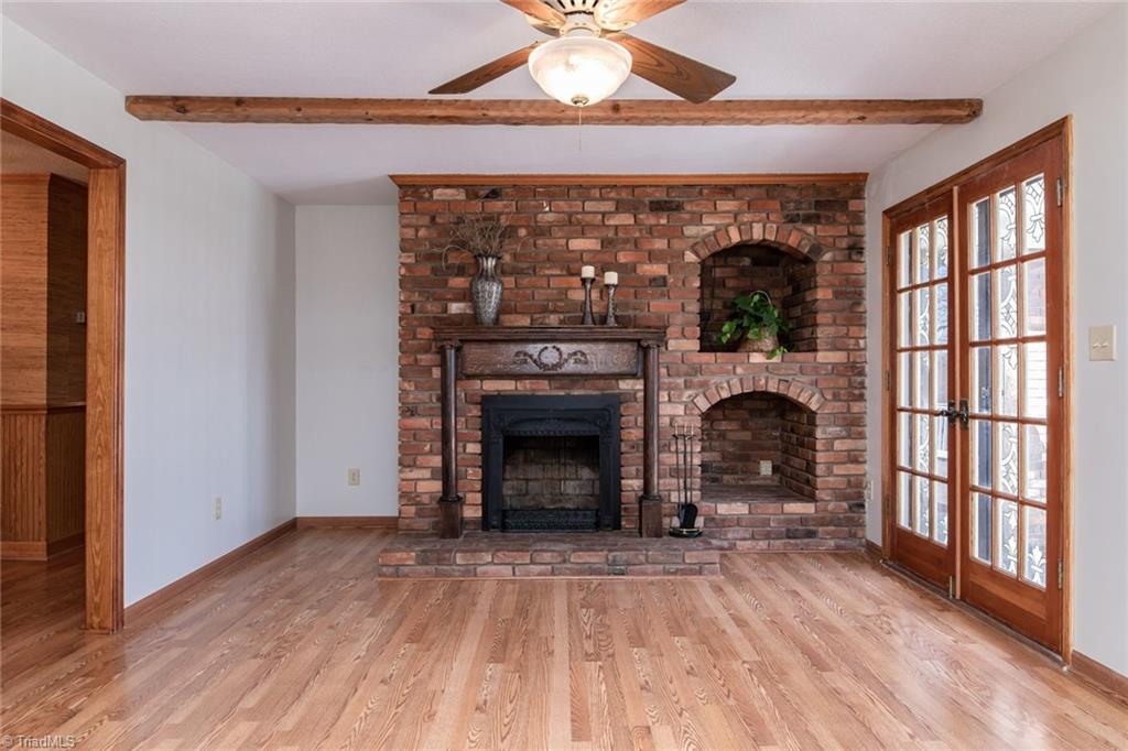 190 Brim Road Mount Airy, NC 27030 - Photo 19 of 49 Sit by a cozy wood fireplace in the den.