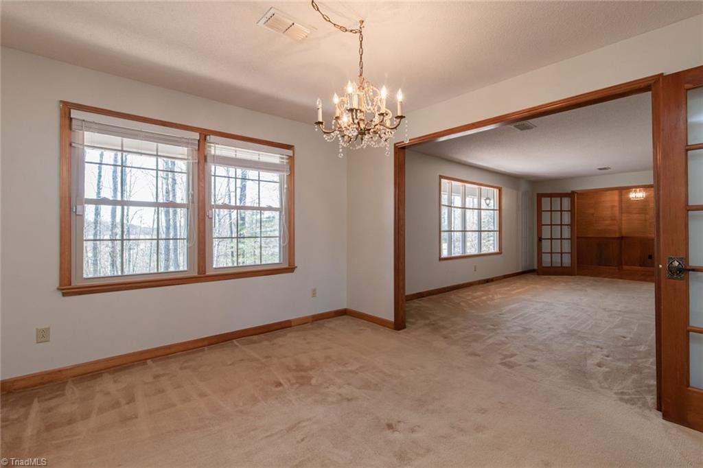 190 Brim Road Mount Airy, NC 27030 - Photo 34 of 49 Solid wood French door entry separate the dining and living room, how lovely.